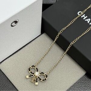 CHANEL Gold and Black Bow Necklace